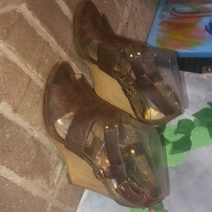 Michael Kors distresses leather wedges